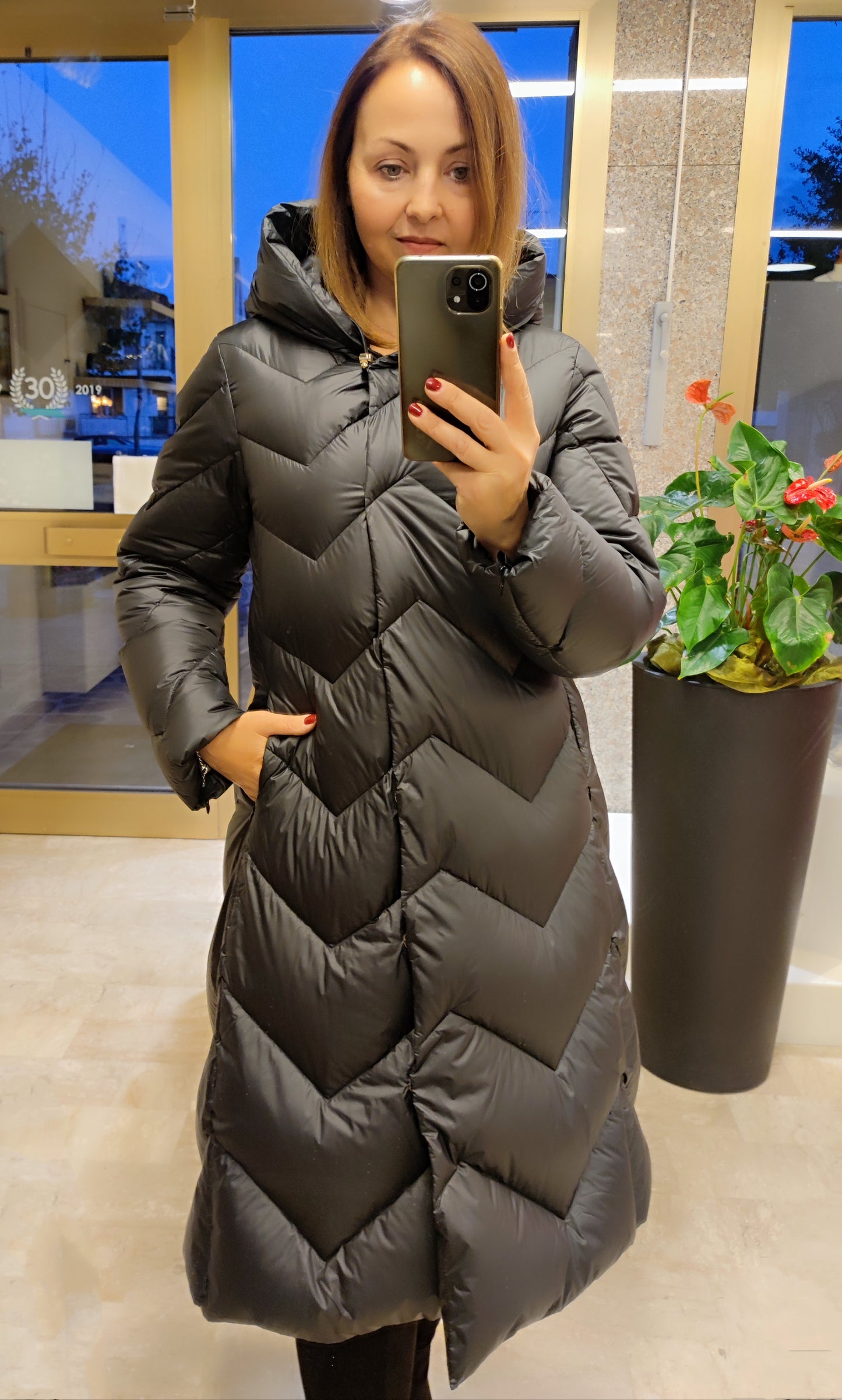 Piumino d'oca lungo chevron