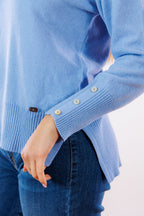 Maglia spacchetti e bottoni