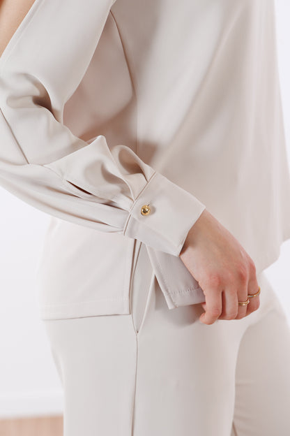 Blusa fluida anelli dorati