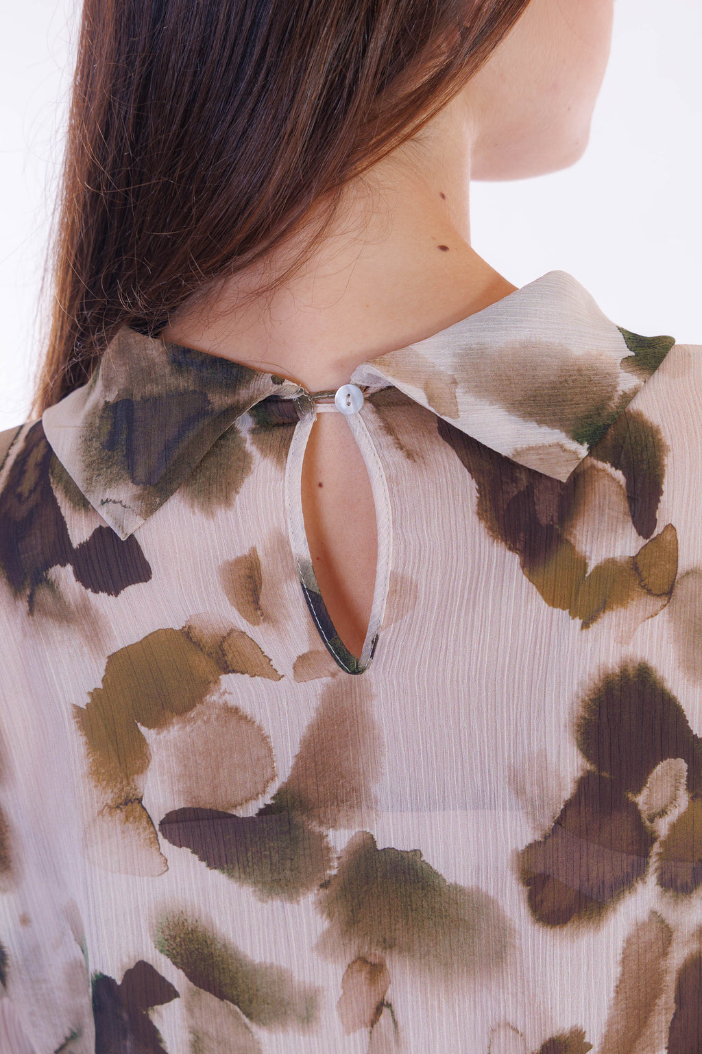 Blusa fantasia collo ad anello