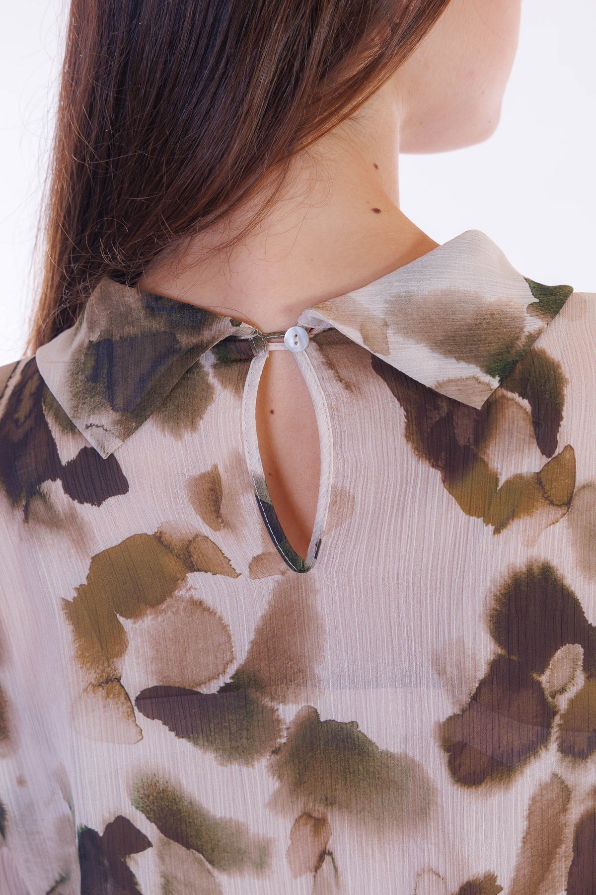 Blusa fantasia collo ad anello
