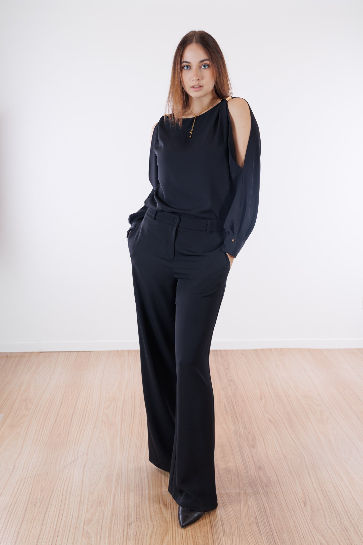 Blusa fluida anelli dorati