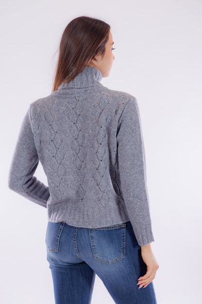 Maglia collo ciambella e trecce