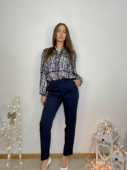 Pantalone cigarette con risvolto