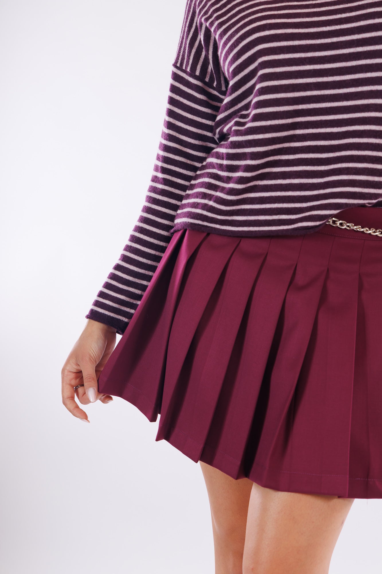 Minigonna pieghe e catena