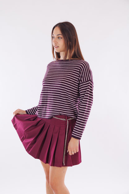 Minigonna pieghe e catena