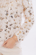 Maglia piume e paillettes
