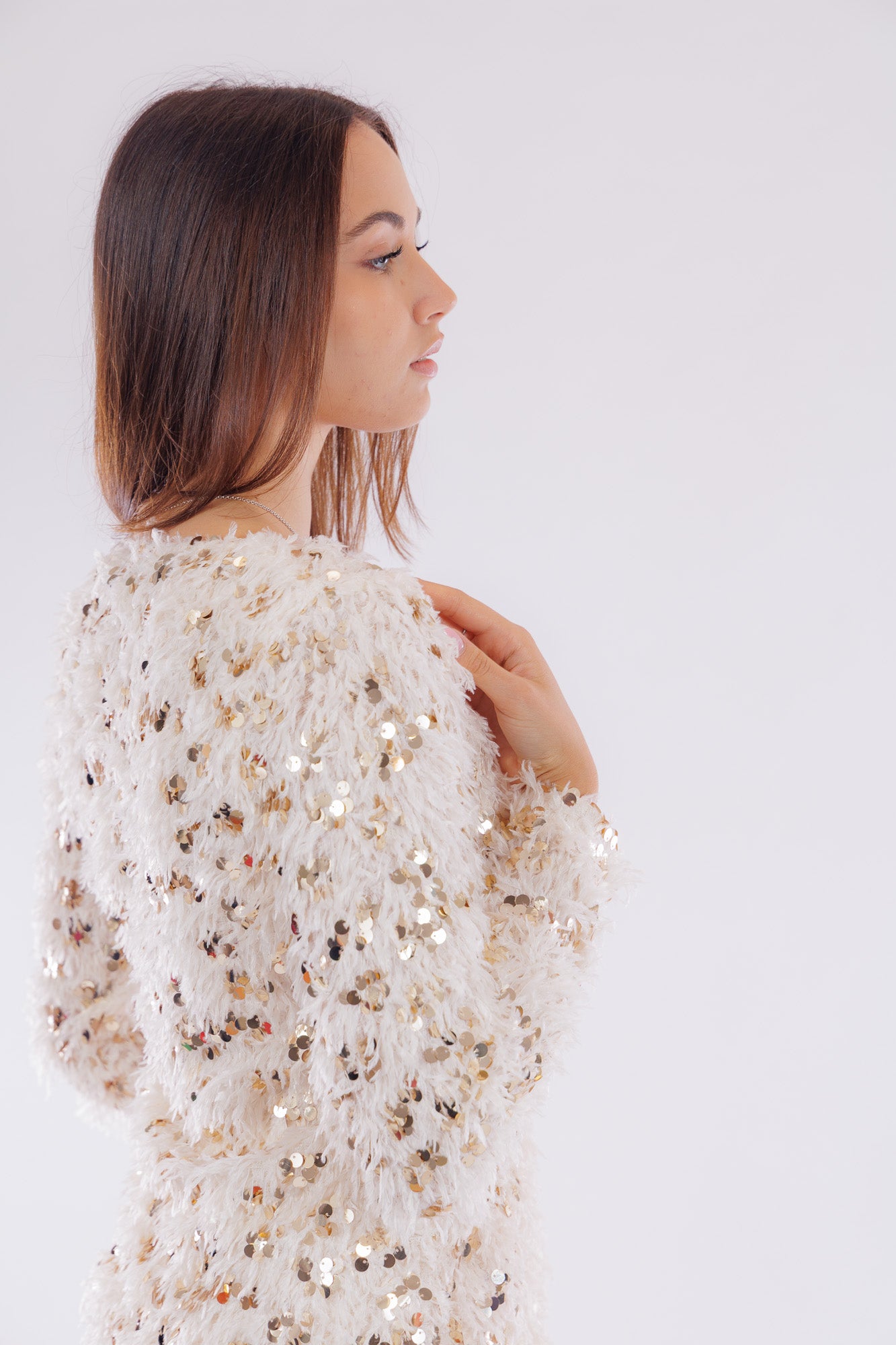 Maglia piume e paillettes