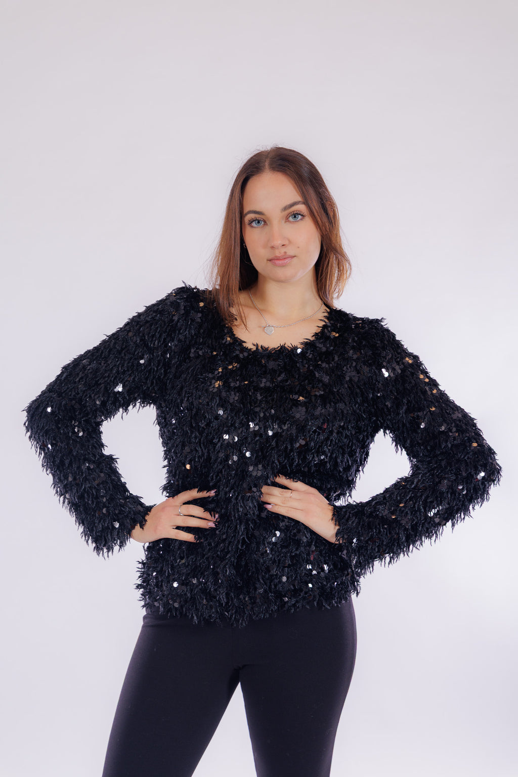 Maglia piume e paillettes