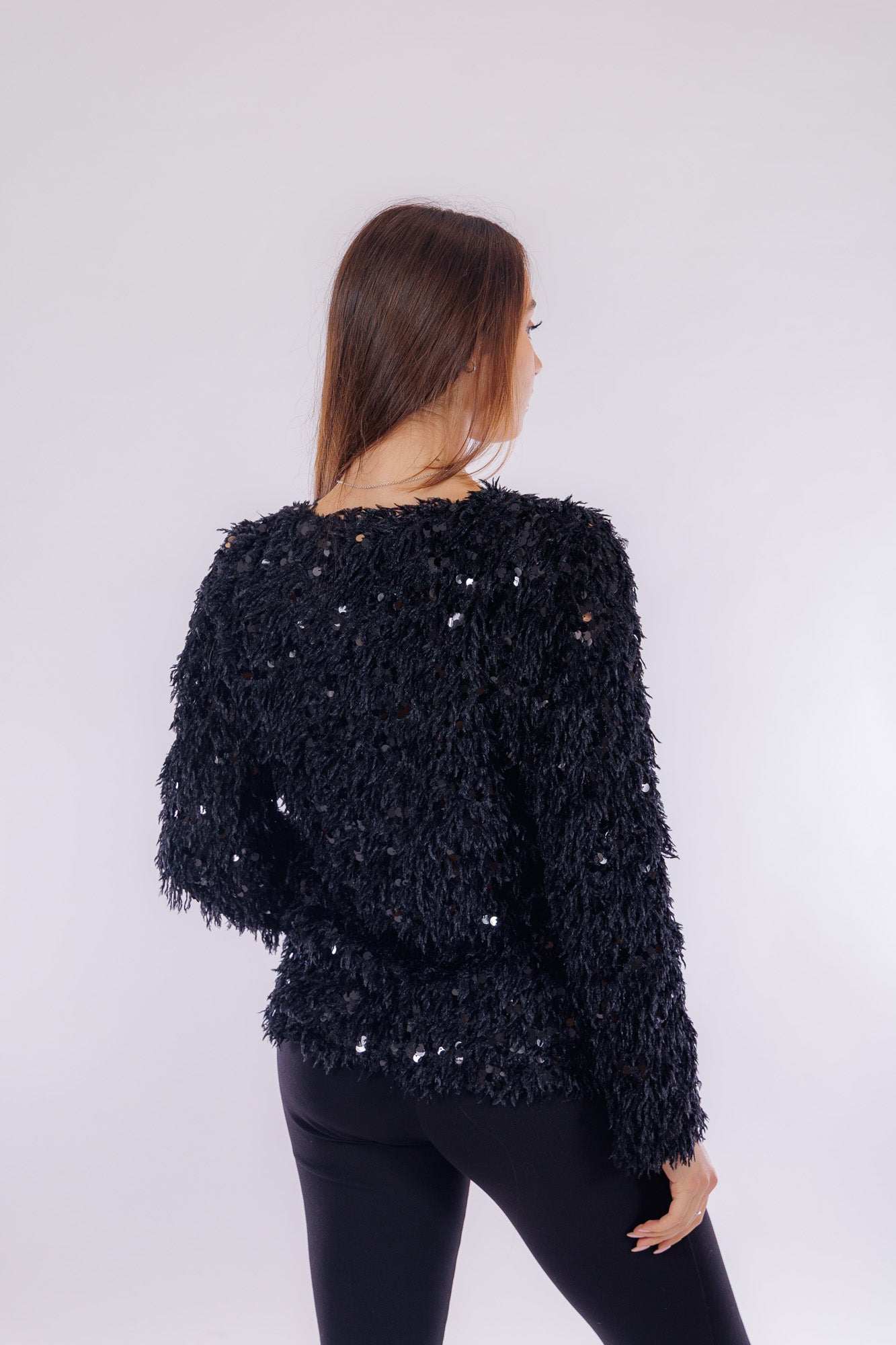 Maglia piume e paillettes