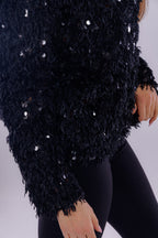 Maglia piume e paillettes