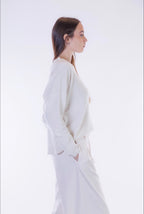 Maglia scollo V spilla