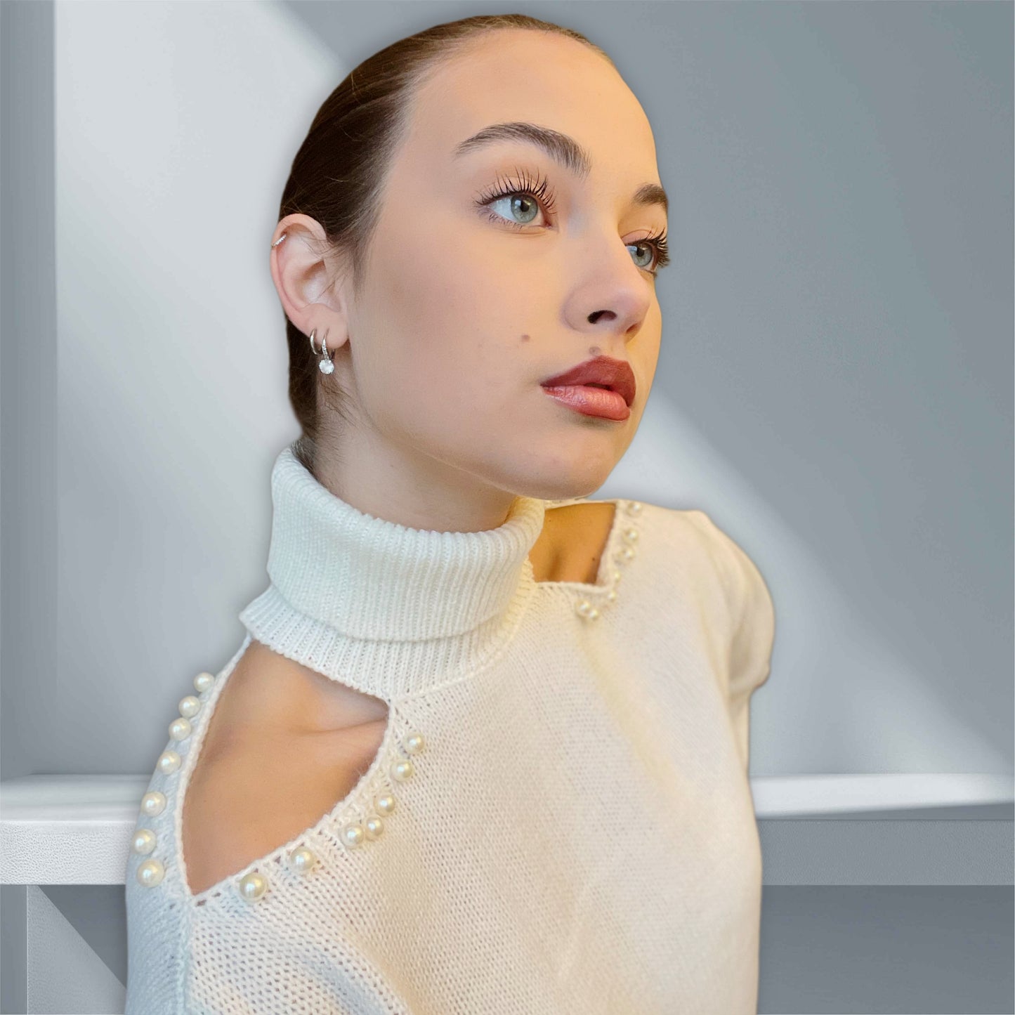 Maglione oblò spalle