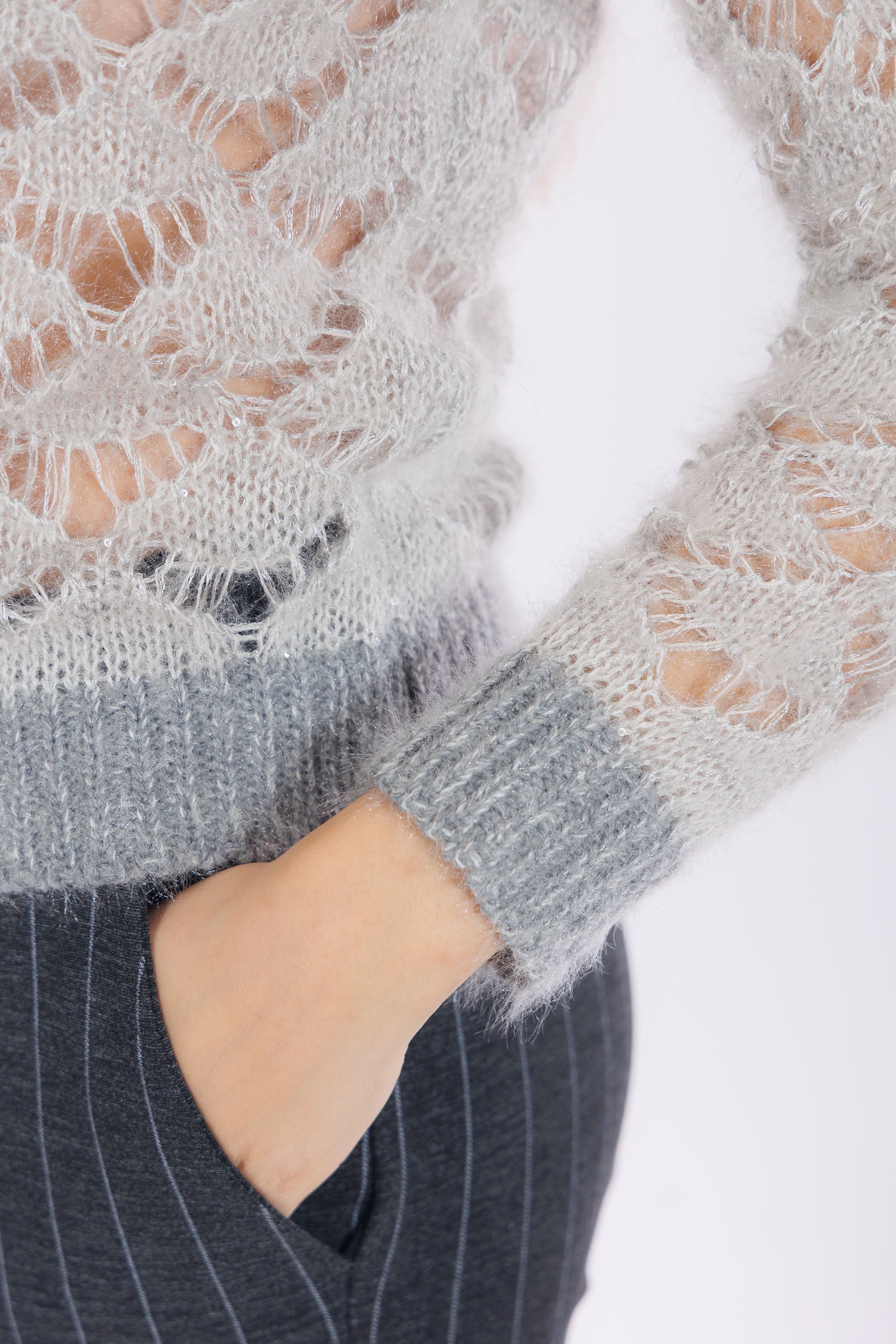 Maglia traforata micro paillettes