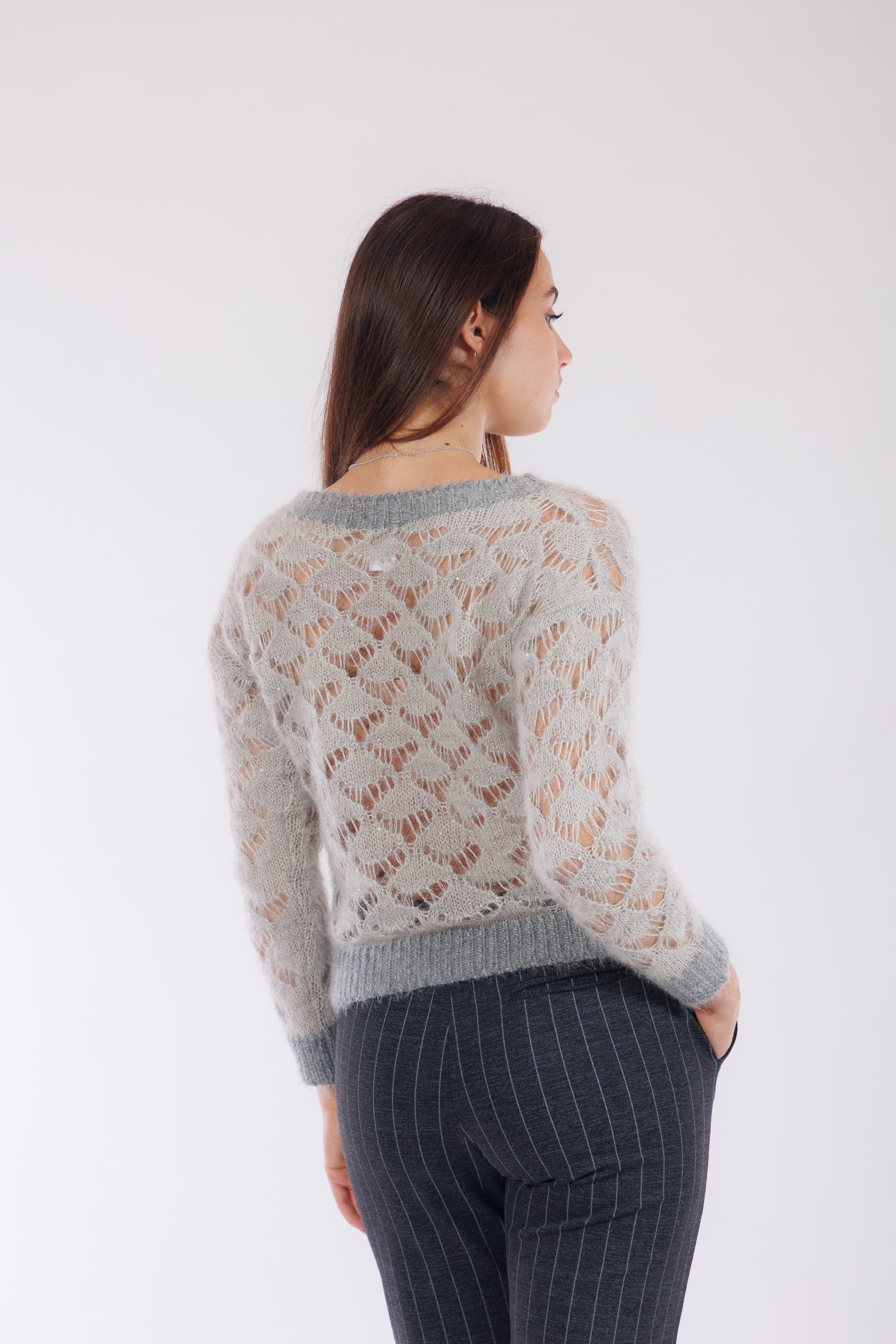 Maglia traforata micro paillettes