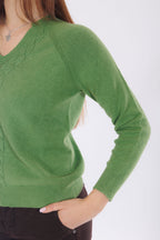 Pullover treccia davanti