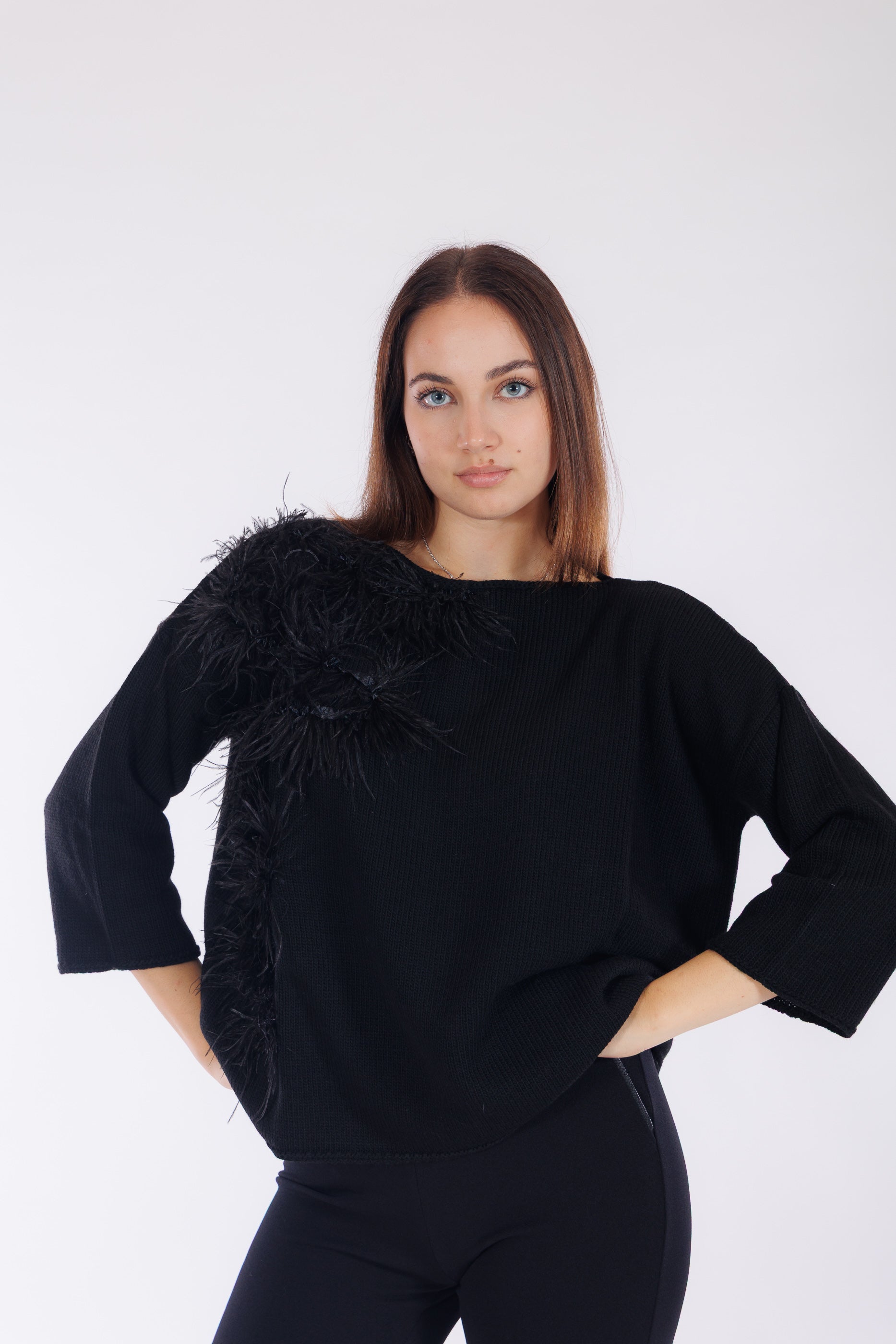 Maglia piume sul lato