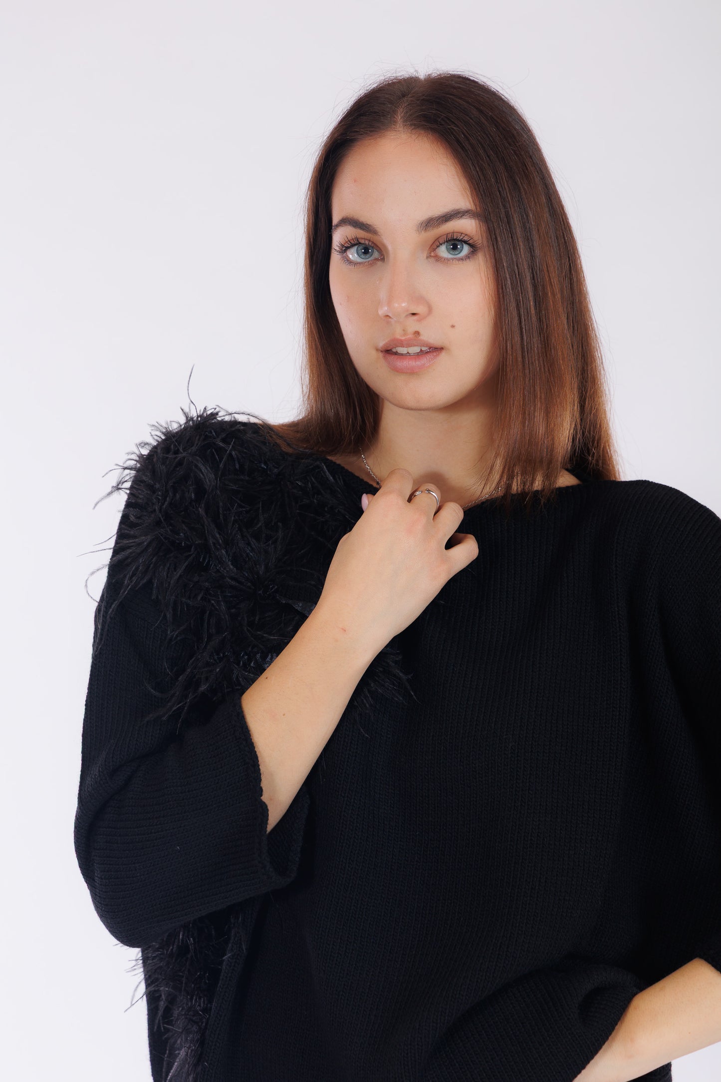 Maglia piume sul lato