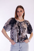Blusa maniche a sbuffo