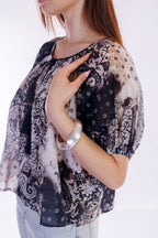 Blusa maniche a sbuffo