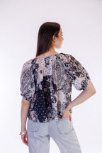 Blusa maniche a sbuffo