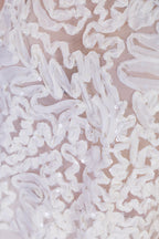 Top ricami e paillettes