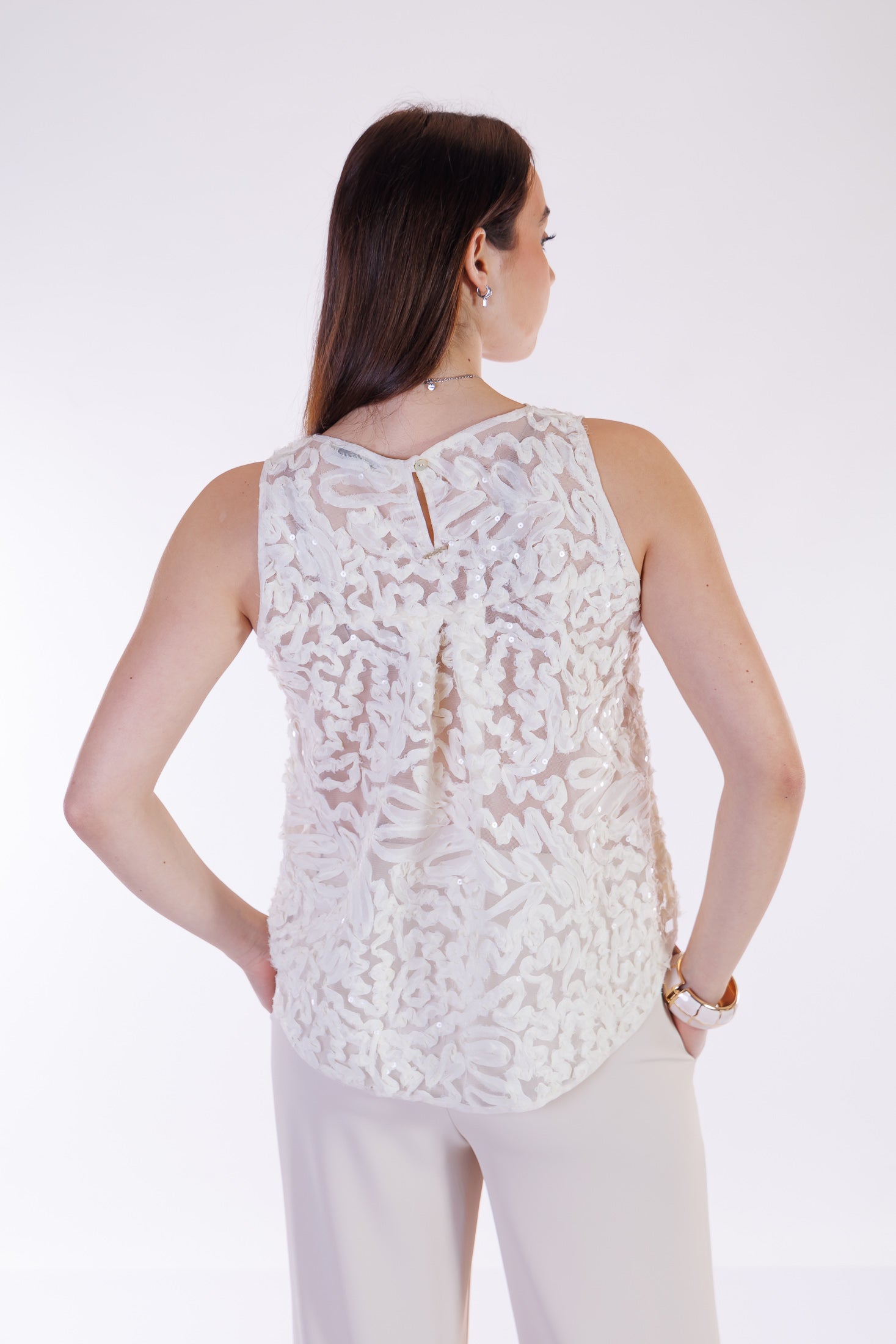 Top ricami e paillettes