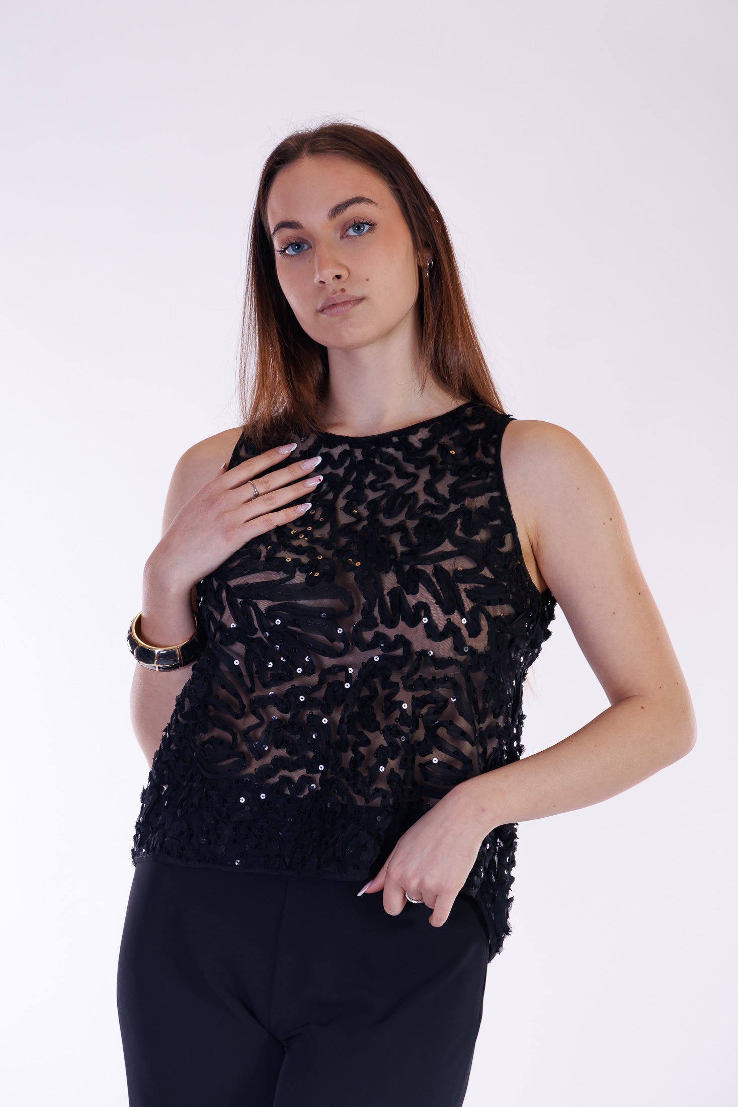 Top ricami e paillettes