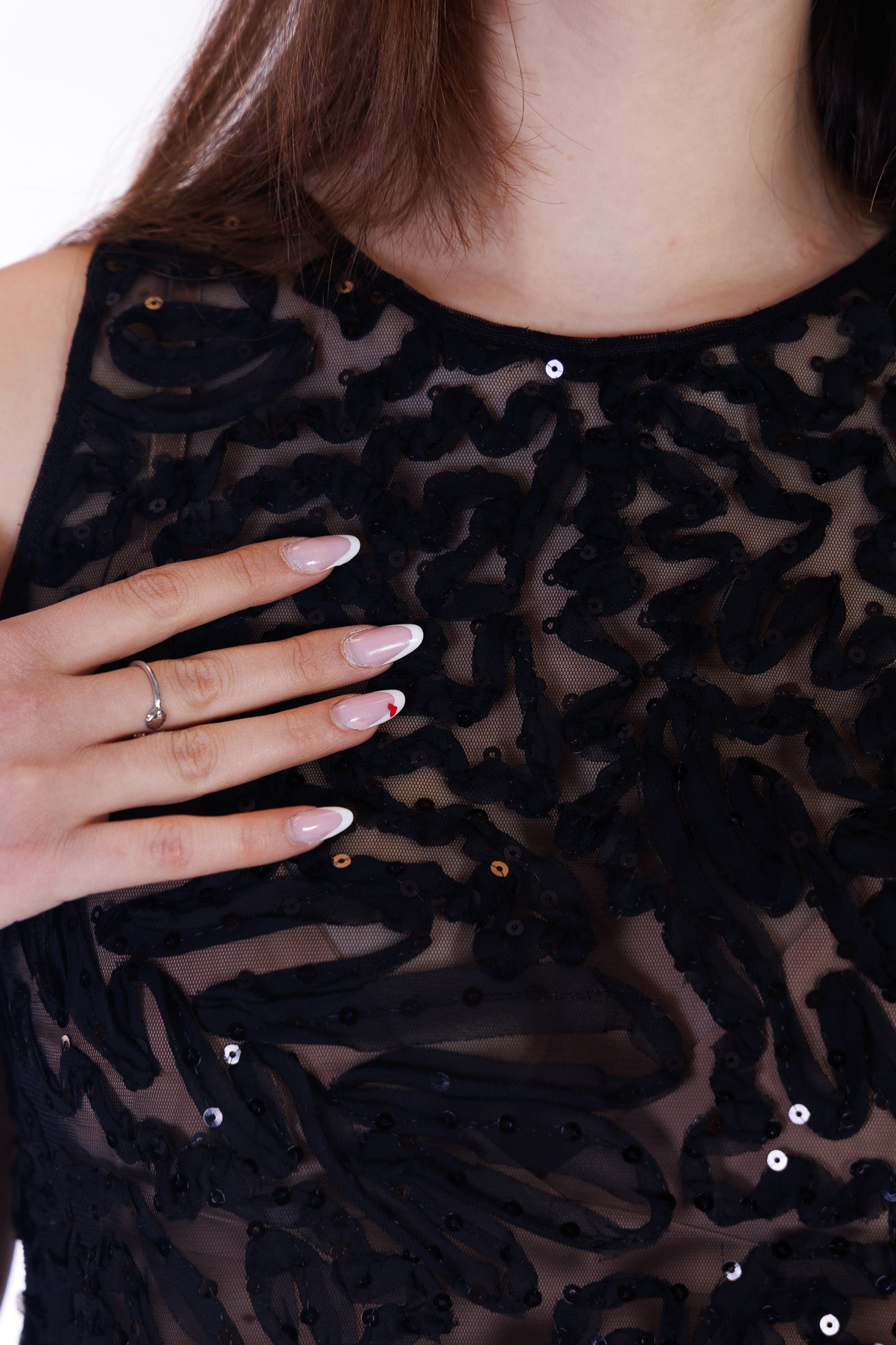 Top ricami e paillettes