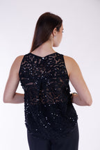 Top ricami e paillettes
