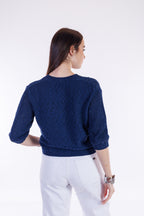 Maglia bottoncini e micro paillettes