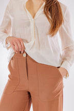 Pantalone largo tasconi