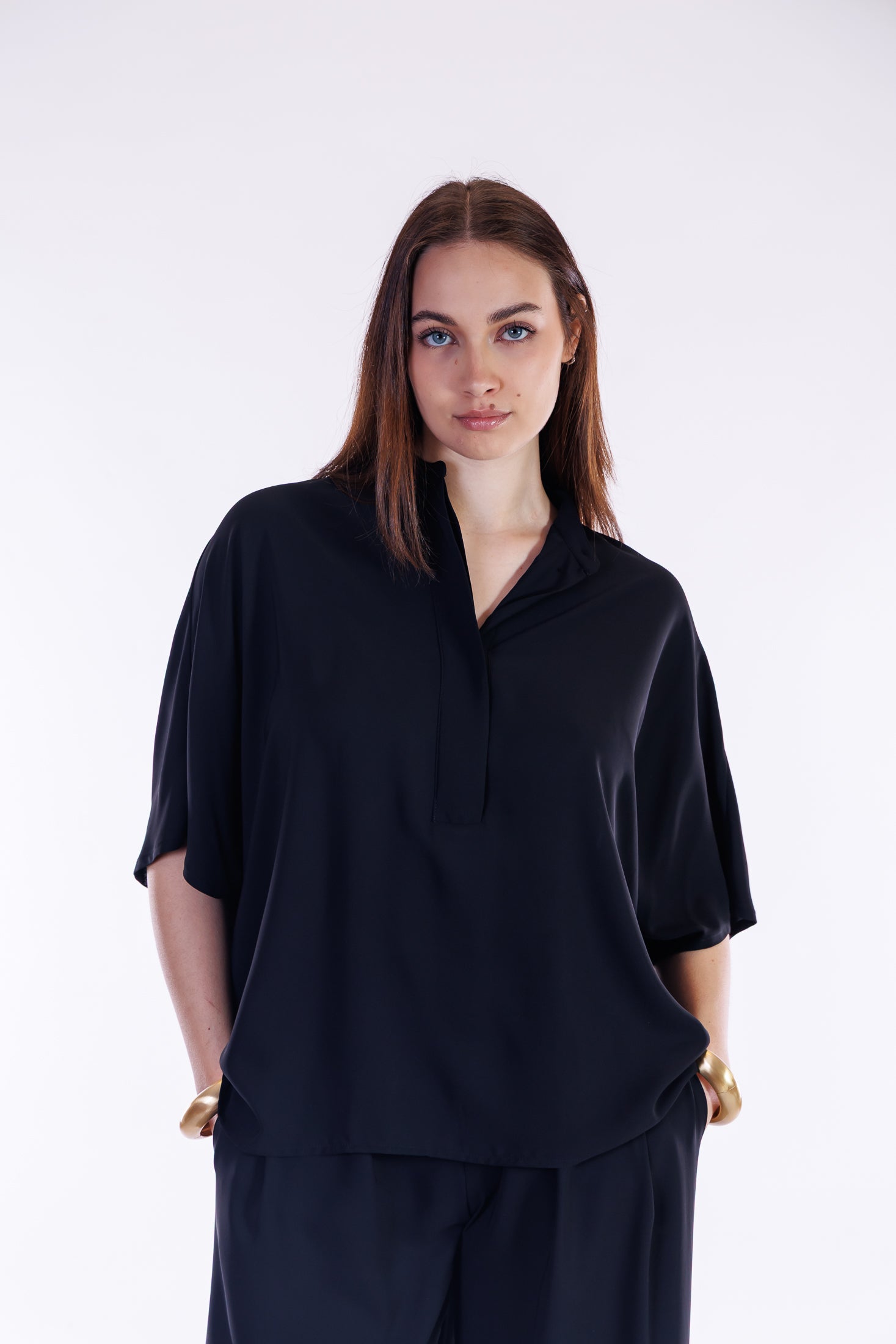 Blusa over fluida
