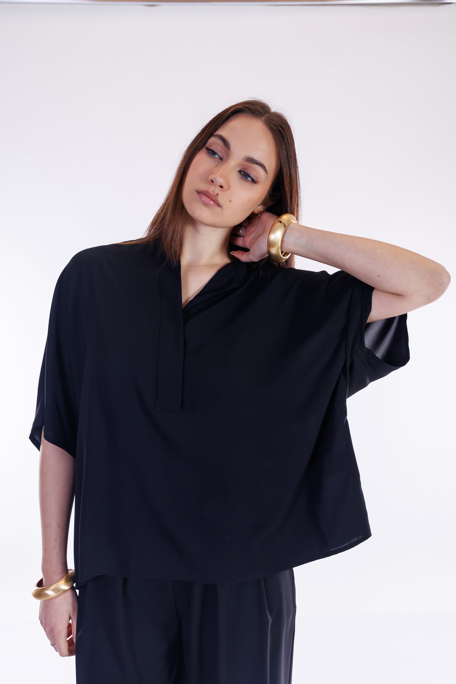 Blusa over fluida